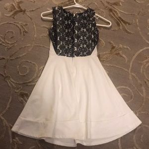 Dress with black flower lace on the back.